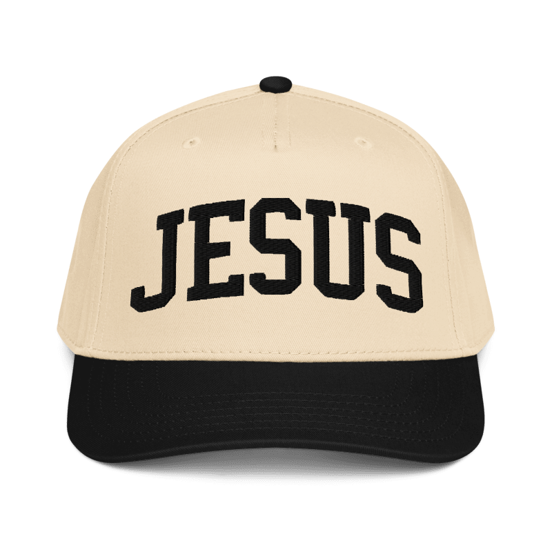 Beige cap with 'JESUS' printed in black on a white background