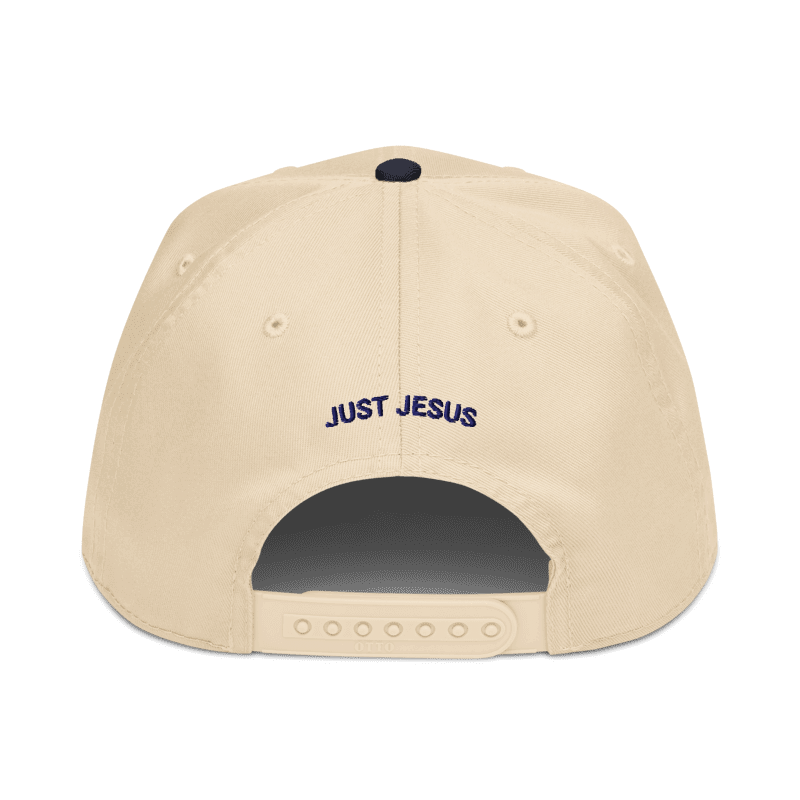Beige cap with 'JUST JESUS' text on a white background